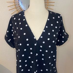 Navy blue high low hem dress with white polka dots
